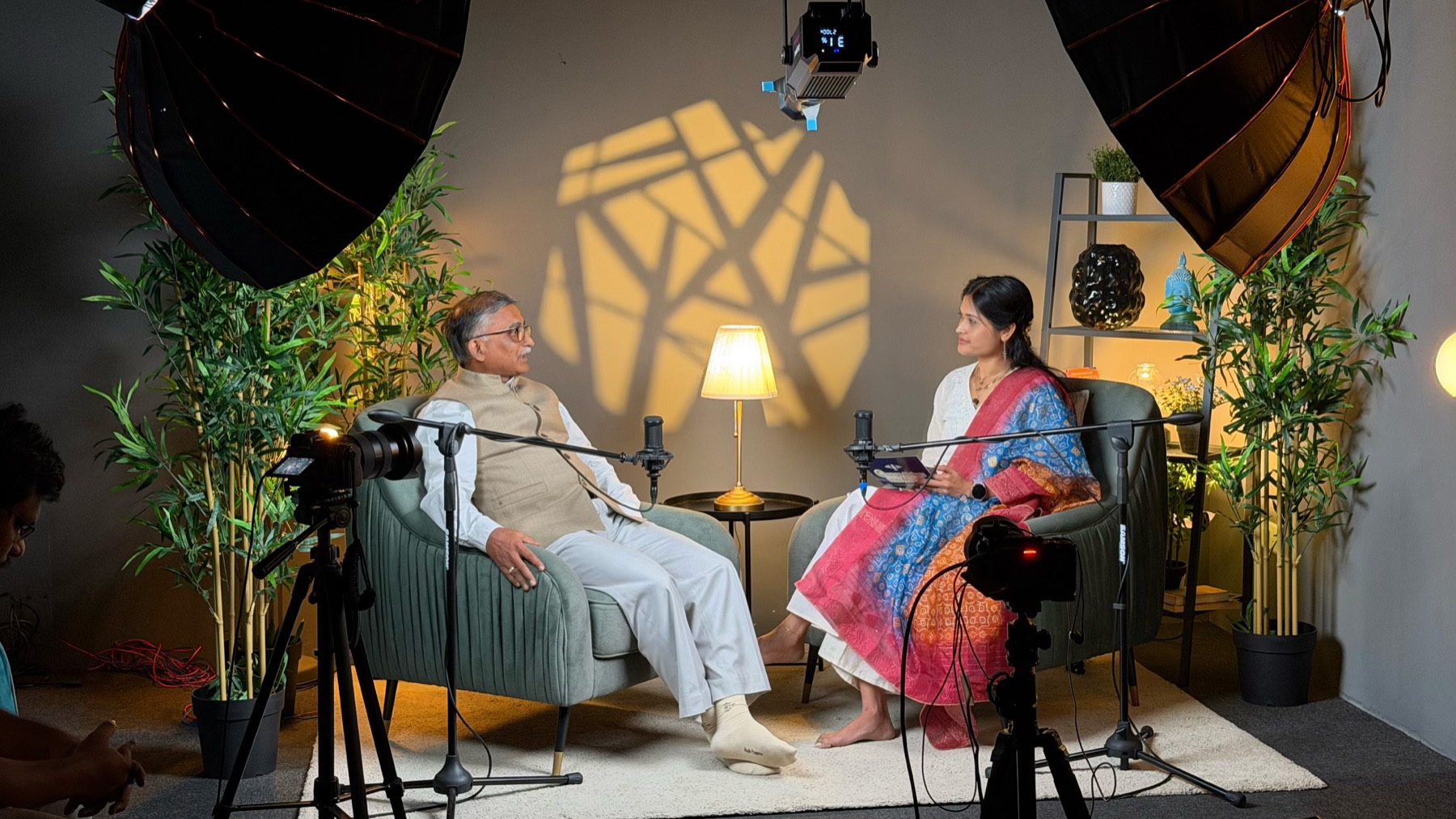 The Verandah set — warm lamp light and dappled shadows during a recording